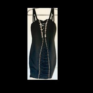 Black bandage dress with gold accents